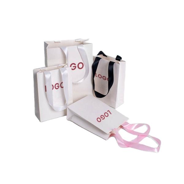 Buy cheap Square Bottom Kraft Paper Gift Bags With Handles for Shopping and Cardboard Material from wholesalers