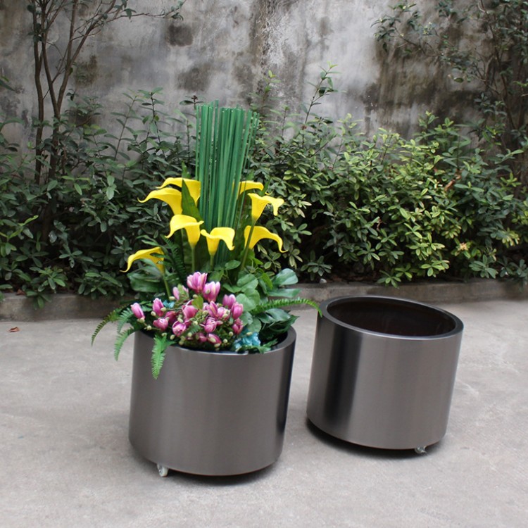 Outdoor black cylinder medium cast iron flower pot with wheels