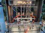 PLC Control Bottle Filling Line Equipment 700-1500BPH For Coconut Oil