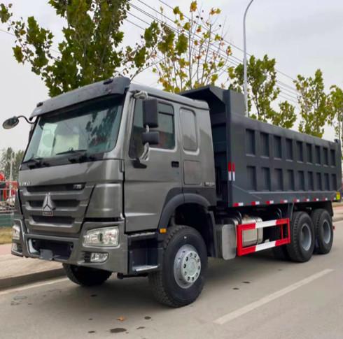 Buy cheap used dump truck HOWO tractor truck SINOTRK 371HP red yellow from wholesalers