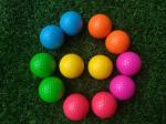 fluorescent golf ball , golf balls , fluorescent golf balls in black light (glow