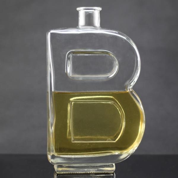 Buy cheap Base Material Glass Bottle with Unique Letter Shape and Cork Cap from wholesalers