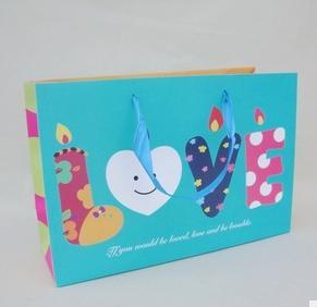 Buy cheap 2014 new design christmas gift paper bag from wholesalers