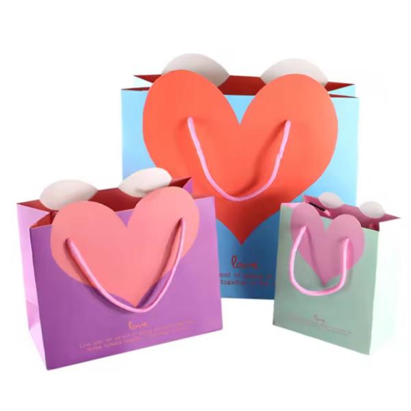 Buy cheap Custom Design Black Luxury Clothing Shopping Tote Art Gift Paper Bags For Clothes from wholesalers