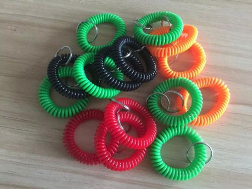 Buy cheap Colorful wrist badge accessories stretchable wrist coil bands plastic promotional key ring from wholesalers