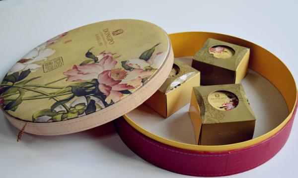 Buy cheap fancy quanlity round gift tea box from wholesalers