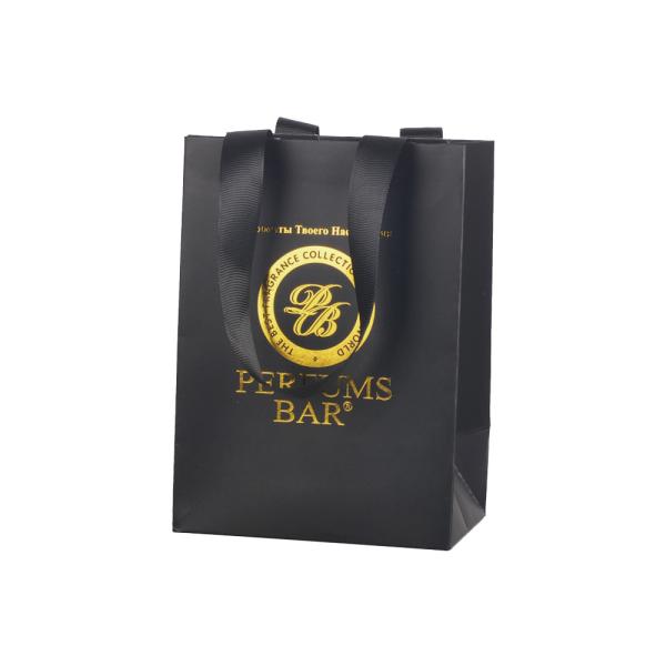 Buy cheap Gold Stamping Black Paper Bags Shopping Packaging With Ribbon Handle from wholesalers