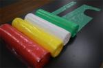 Household Colored Disposable PE Apron On Rolls Round Neck Fluid Prevention