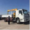 Buy cheap Sinotruk HOWO 4x4 290hp Truck Mounted Crane 6.3 Ton Telescopic Boom 12.00R20 Tire from wholesalers