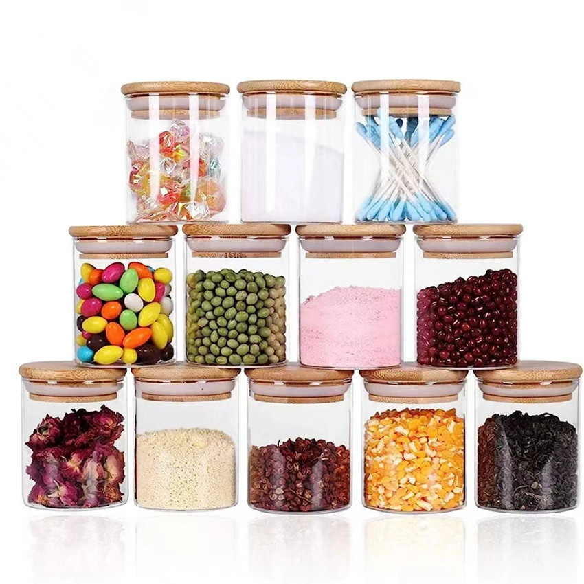 ODM / OEM Customized Sleek Home Round Glass Storage Jar 8oz 26oz Food Storage Glass Jar With Airtight Bamboo Lid Elegant And Practical Design