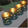 Buy cheap Electroplate blue glass votive candle holder with hollow sea fish decor from wholesalers