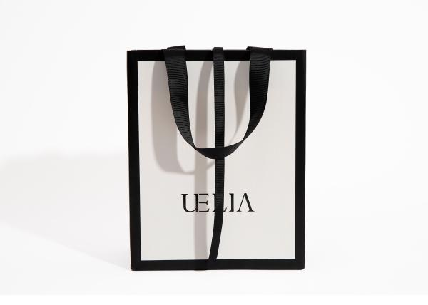 Buy cheap Custom Printed White Luxury Boutique Paper Bag 250g For Clothes from wholesalers