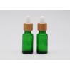 Buy cheap Green Oil 18mm Cosmetic Glass Dropper Bottles With Bamboo Dropper Printing Pipette from wholesalers