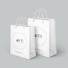 Buy cheap Foldable Wedding Custom White Paper Bags 200gsm Varnishing Surface Handling from wholesalers
