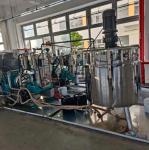 Dual power sand mill