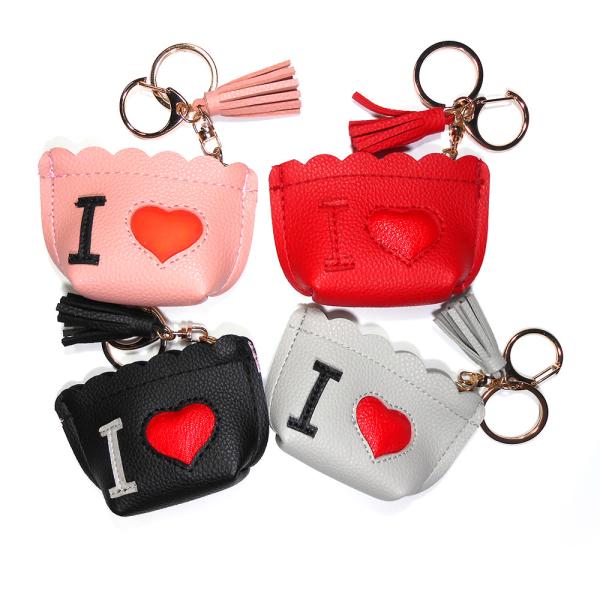 Buy cheap Portable 32g Pink Laser Logo Mini Purse Keychain With Trendy Charm Tassels from wholesalers