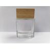 Buy cheap 50ml Glass Perfume Bottles With Wooden Cap Transparent Makeup Packaging Various Color And Printing from wholesalers