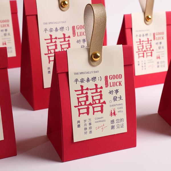 Buy cheap Custom candy box creative wedding candy packaging box candy gift box empty box candy bag with hand gift from wholesalers