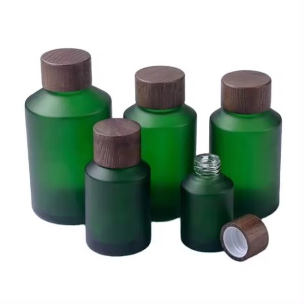 Buy cheap 30g,50g,15ml,30ml,60ml,120ml, Green Frosted Glass Bottle With Wooden Screw Lid from wholesalers