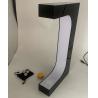 Buy cheap factory customize led light magnetic levitation pop sneaker shoes display racks from wholesalers