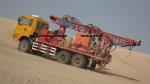 3D seismic shothole drilling rig in desert