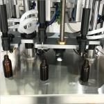 1000ml 4 Heads Automatic Filling Perfume Production Equipment Vacuum Practical