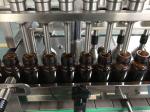1000BPH Small Perfume Production Equipment Milk Bottle Filling Machine