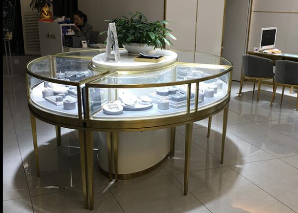 Buy cheap Shop Middle Island Round Jewelry Display Fixtures Custom Golden SS Jewellry Display Shelf from wholesalers