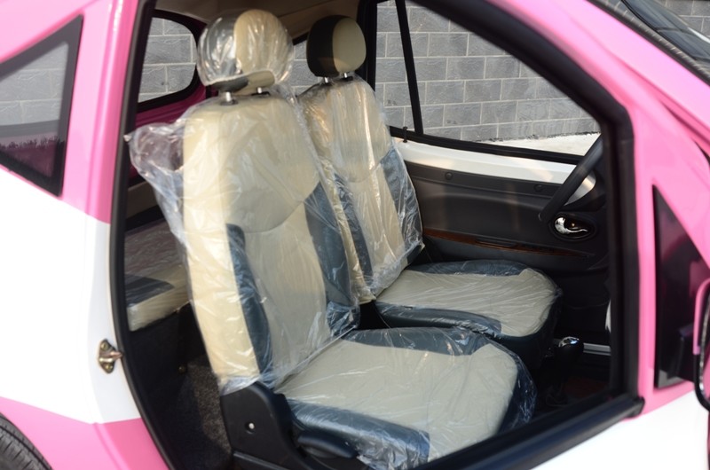 Lithium Battery Long Ranger Electric City Car 2 Comfortable Seats Integral Axle Rear Suspension