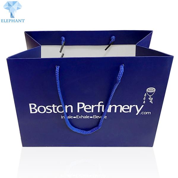 Buy cheap Wholesale Custom Logo White High Quality Cheaper Paper Gift Bags With Handles from wholesalers