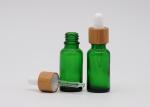 Green Oil 18mm Cosmetic Glass Dropper Bottles With Bamboo Dropper Printing