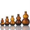 Buy cheap Brown Glass Bottles Containers High Sealing Performance Amber Gourd Shape from wholesalers