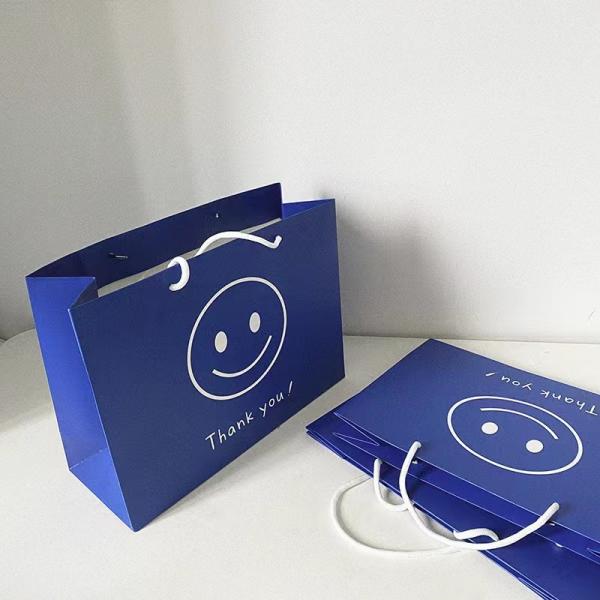 Buy cheap 35*26cm Printed Paper Shopping Bags from wholesalers