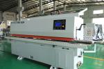 6.3KW Motor PLC Controlled Woodworking PVC Edge Banding Machine for Manufacturin
