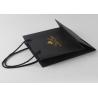 Buy cheap Reusable Black Paper Boutique Shopping Bags Imprinted With Silver Stamping from wholesalers