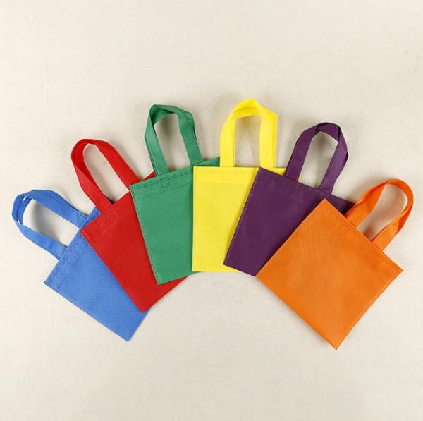 Buy cheap Reusable Party Non-Woven Favor Bags 9.5×9.5 Inch Pinata Goodie Gift Bag Colorful Tote Candy Bags For Birthday Weeding Party from wholesalers