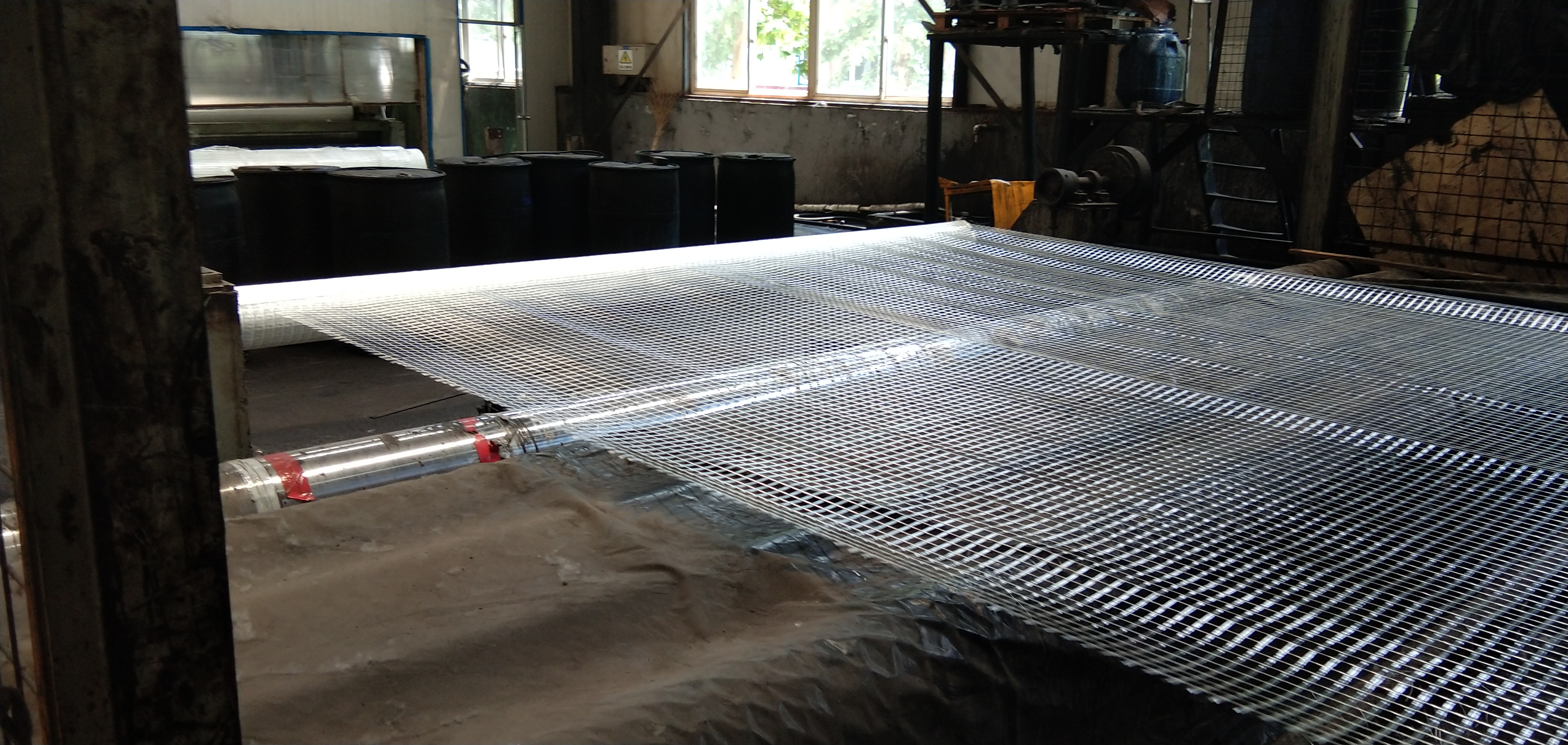 Biaxial Fiberglass Geogrids The Essential Component for Parking Lot Reinforcement