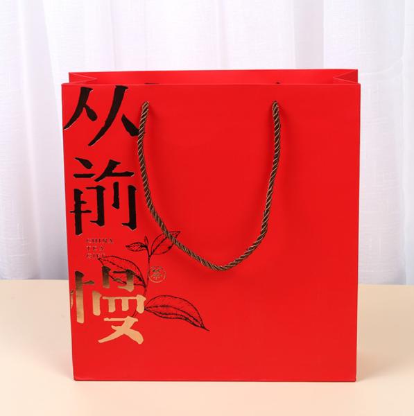 Buy cheap Gold Foil Red Matt Laminated Kraft Paper Shopping Bags With Handles from wholesalers