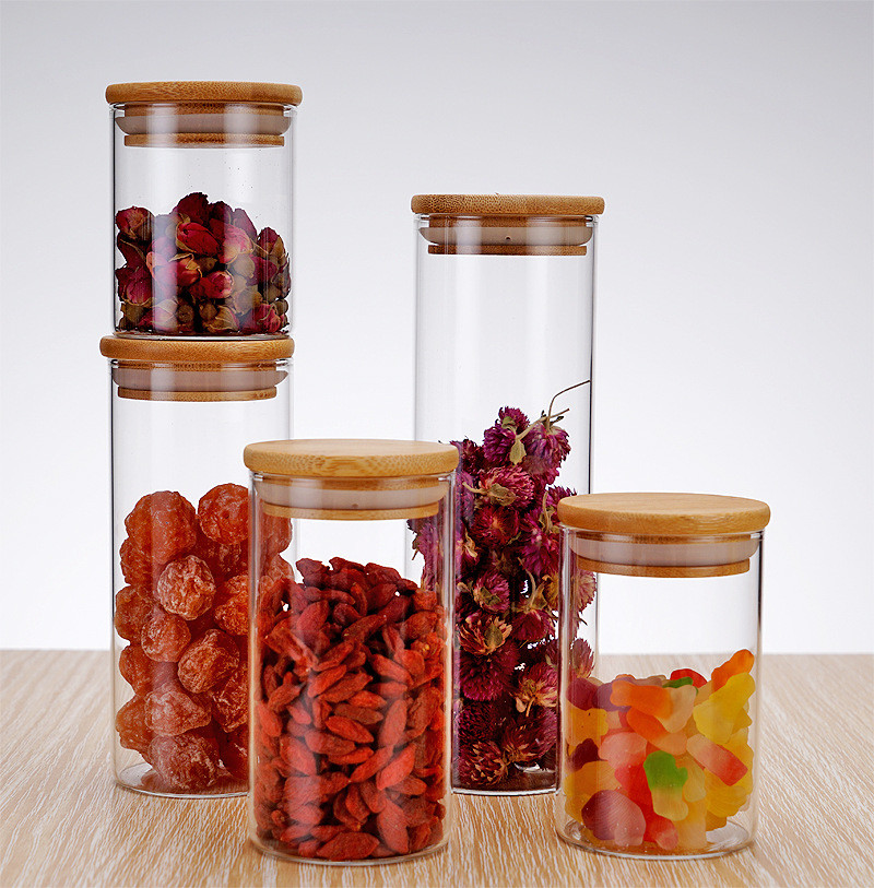 ODM / OEM Customized Sleek Home Round Glass Storage Jar 8oz 26oz Food Storage Glass Jar With Airtight Bamboo Lid Elegant And Practical Design