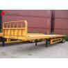 Buy cheap 2- Axis 40 Foot Flat Deck Semi Trailer Baffle 8 Tires 13T FUWA Axles In Yellow from wholesalers