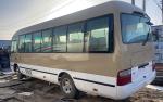 7005x2050x2645 Dimensions 30 Seats Second Hand Coaster Mini Bus with 300L Oil