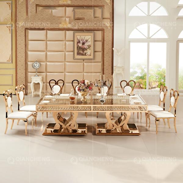 Buy cheap Rose Golden 244x122x75cm Glass Metal Dining Table With Crystal Pendant from wholesalers