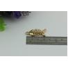 Buy cheap Small light gold fish bones pattern zinc alloy metal handbag logo label tags for sales from wholesalers
