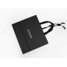 Buy cheap Full Embossing Black Dyed Garment Paper Shopping Bags With Handles from wholesalers