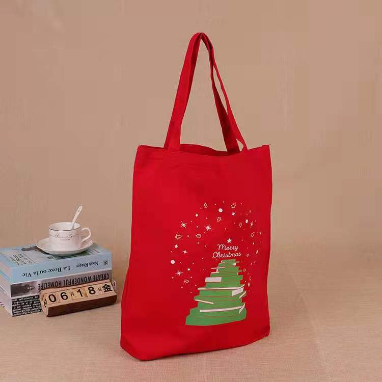 2021 hot selling promotional customized Christmas canvas tote bag reusable Santa shopping bag handbag gift for kids