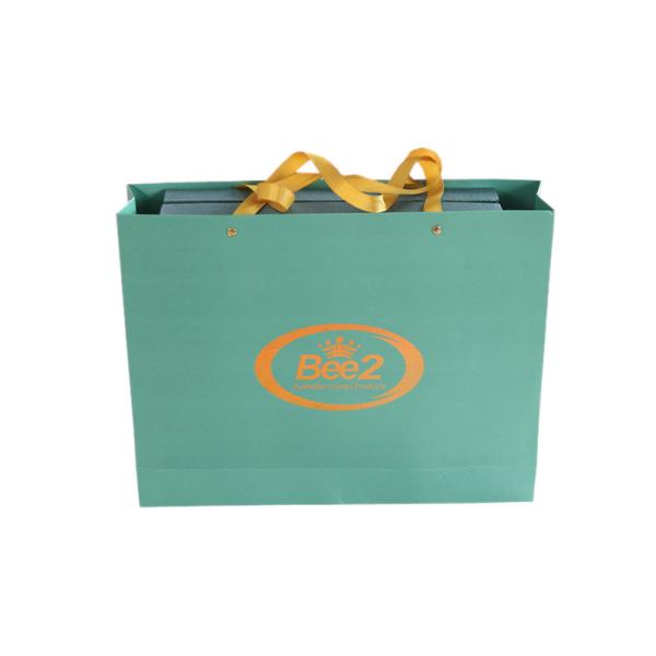 Buy cheap Custom Luxury Printed Paper Gift Bags Packaging With Holographic Logo Factory from wholesalers