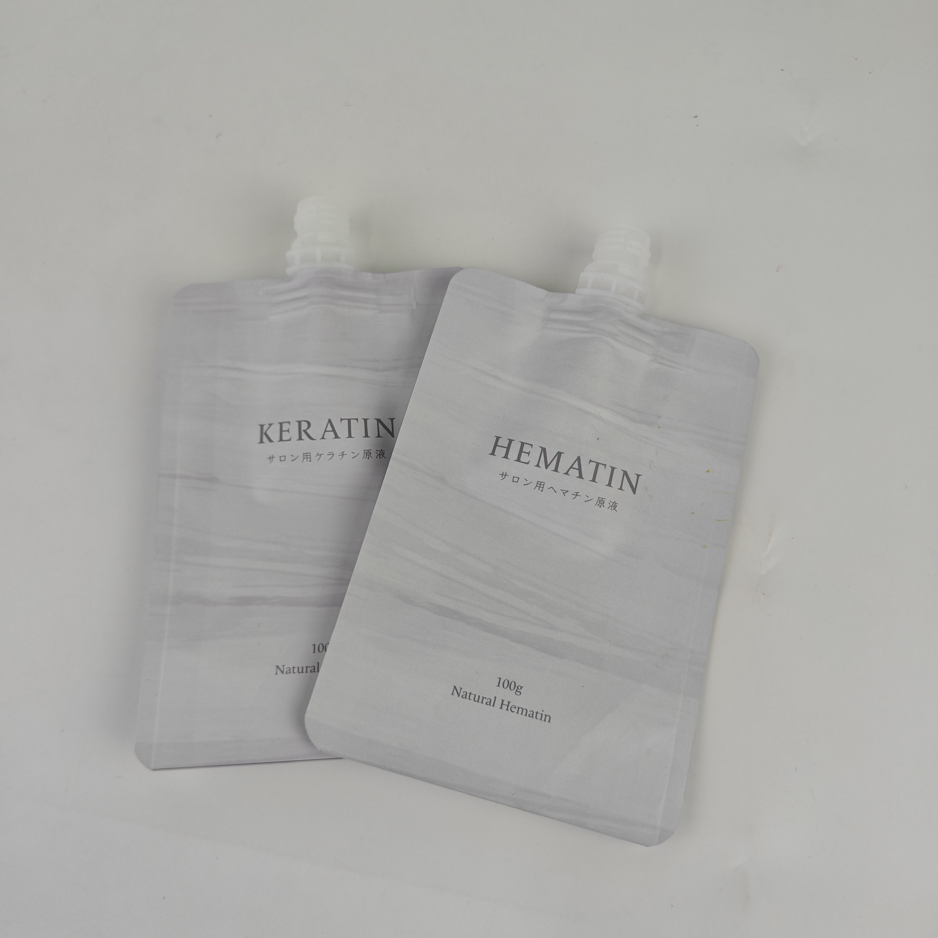 Customized Wholesale 100g Heat Seal Skin Care Cosmetic Plastic Packaging Bag Spout Pouch with Round Corner