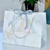 Buy cheap Hot Stamping Custom Luxury Gift Bags Recyclable Kraft Shopping Bags With Handles from wholesalers