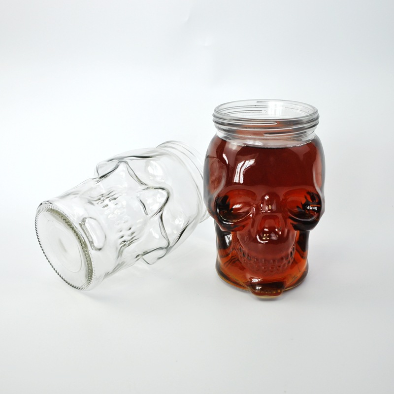 Popular products 17oz custom made glass skulls shaped 510ml mason jar with llid and straw