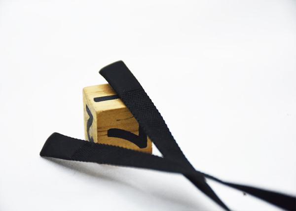 Buy cheap Clothes Black Flat Cotton Tape Ribbon Cord With Both Ends Silicone Drops from wholesalers